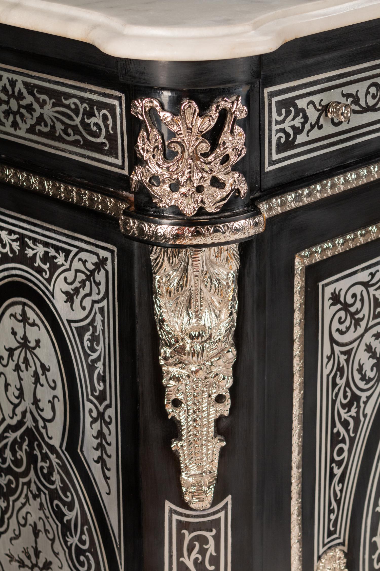 A Pair of Louis XVI Style Pewter-Inlaid Ebonized Muebles d'Appui