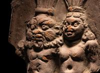 A Romano-Egyptian Terracotta Plaque of Bes and Bessette