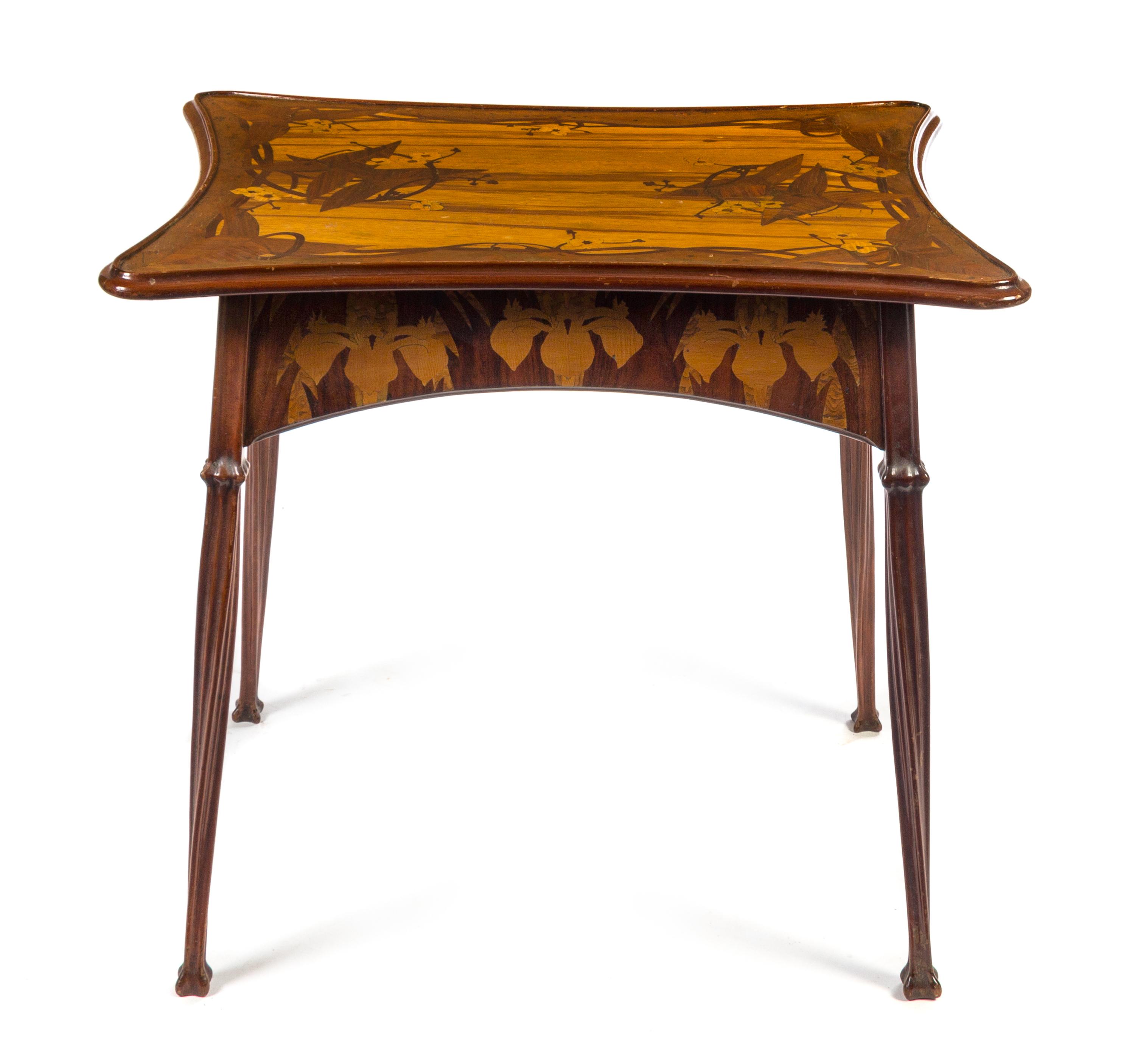 A French Art Nouveau Marquetry Occasional Table Height 29 1/2 x width 32 x depth 24 inches. — ATTRIBUTED TO EMILE GALLE, CIRCA 1900