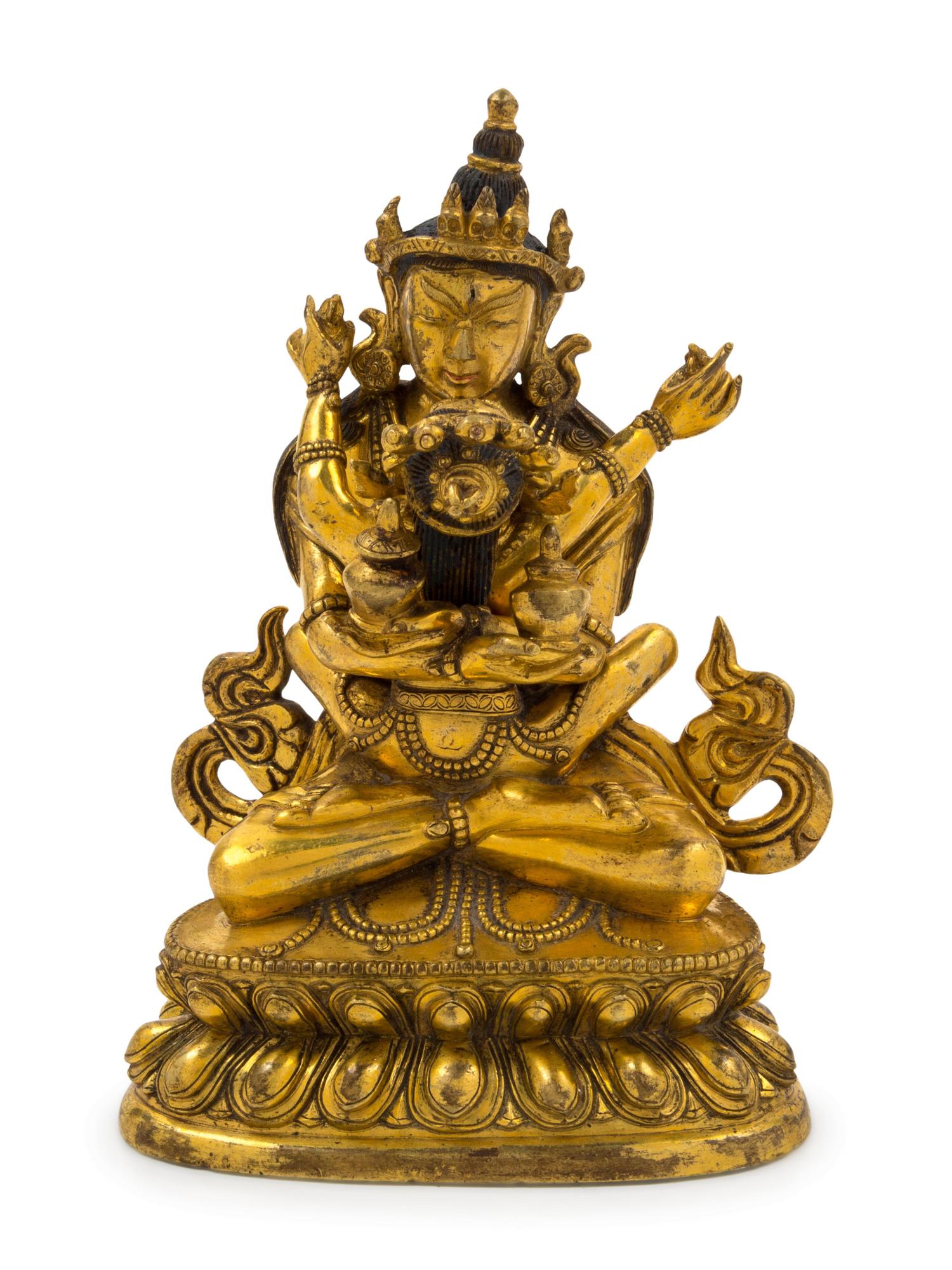 A Sino-Tibetan Gilt Bronze Figure of Vajradhara