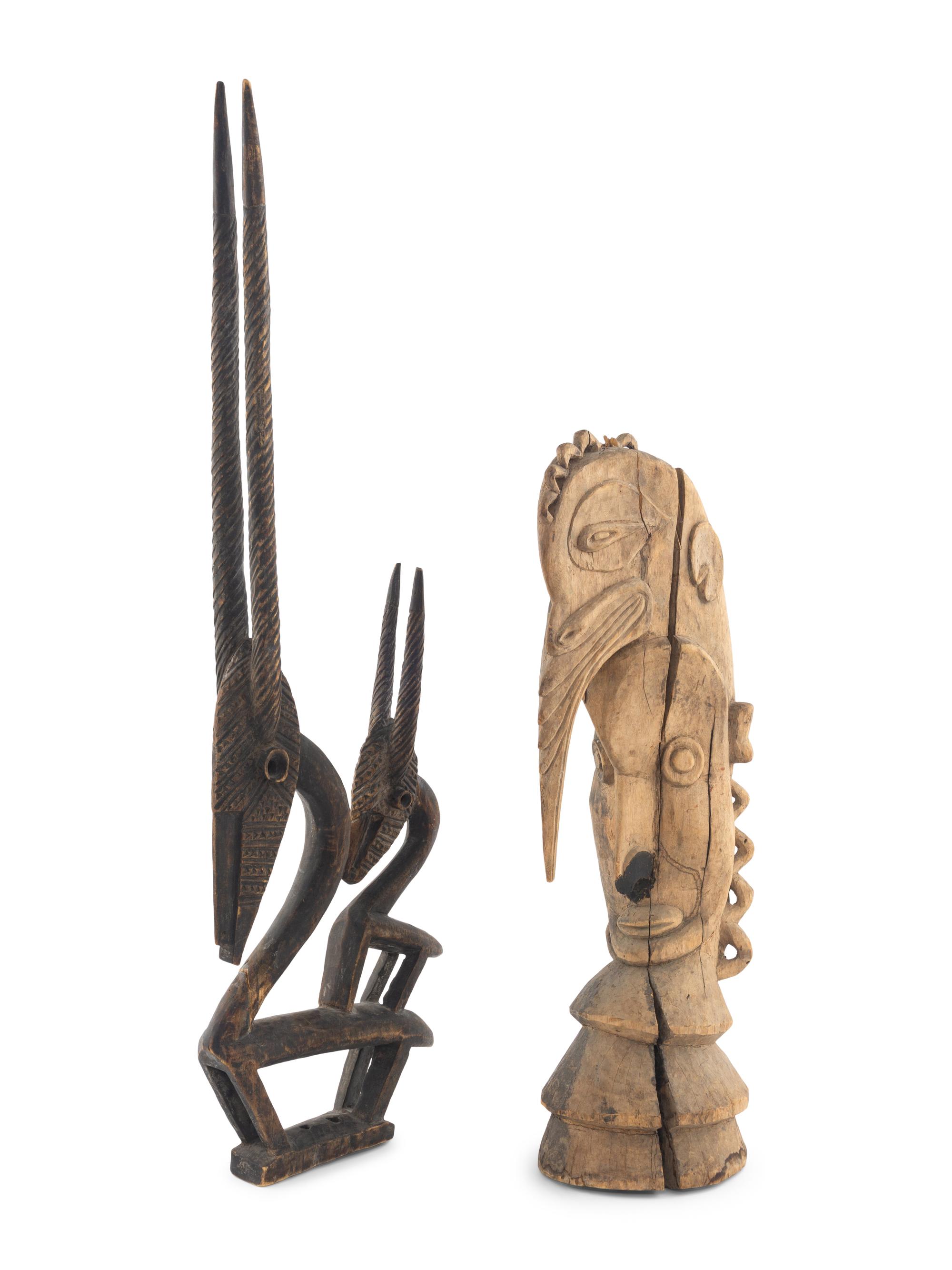 An African Wooden Figure with Bird Headdress
