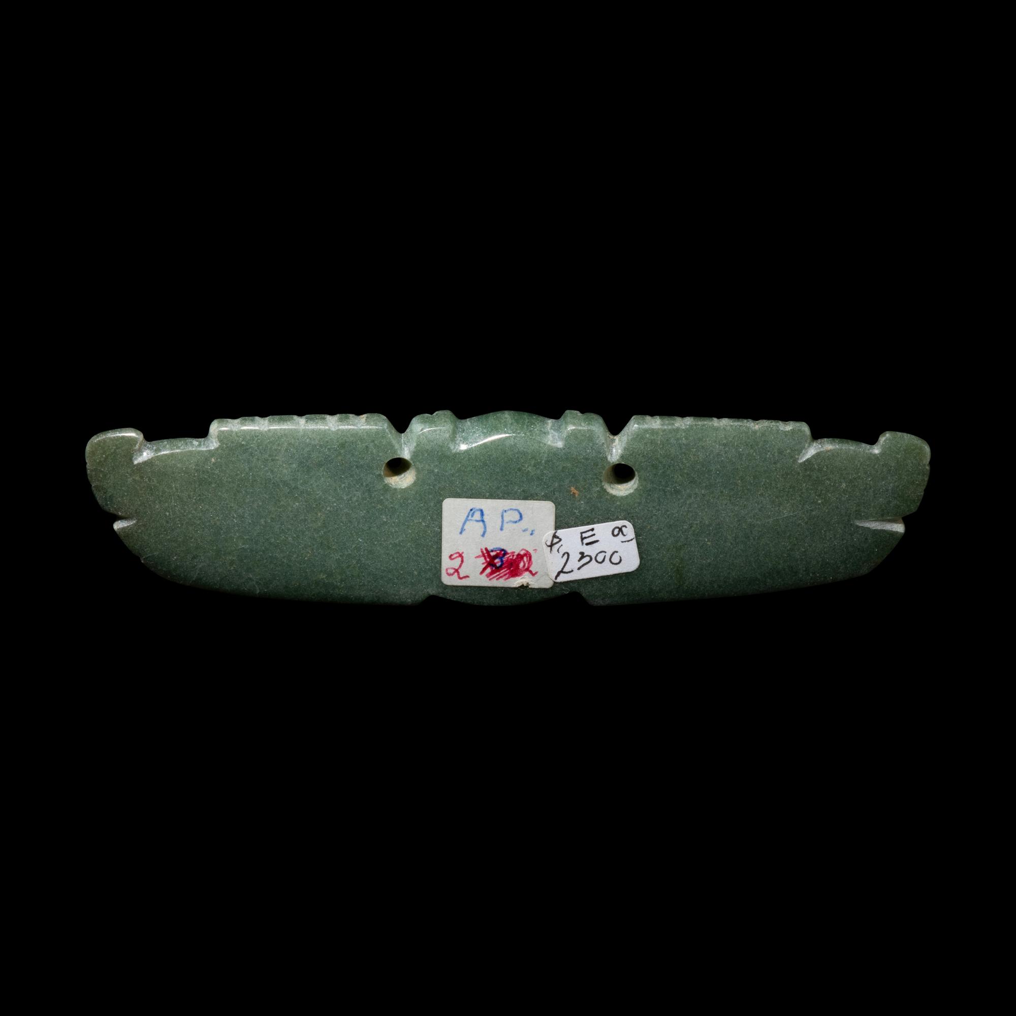 A Costa Rican Jade Two-Headed Bar Pendant