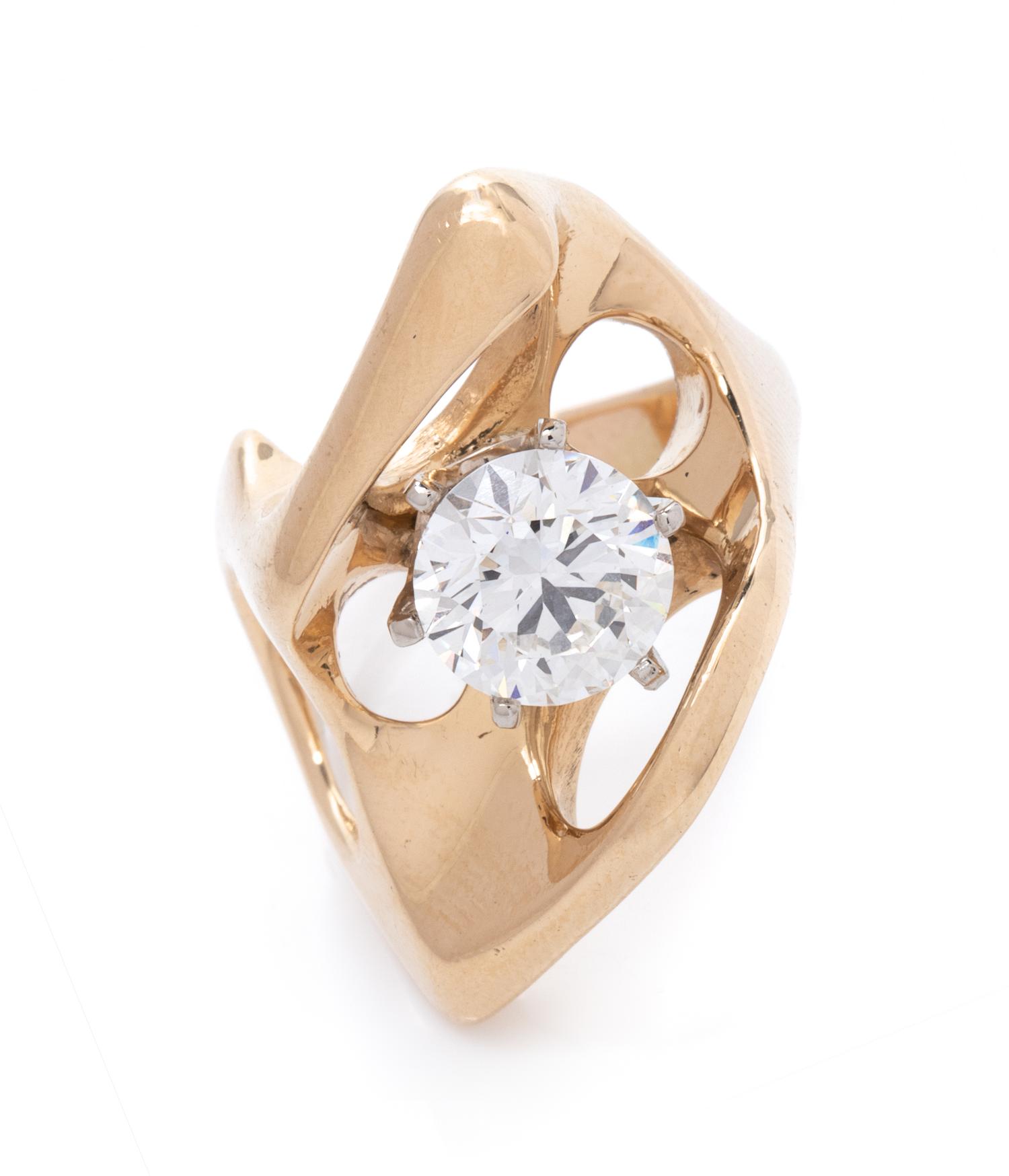 An 18 Karat Yellow Gold and Diamond Ring,