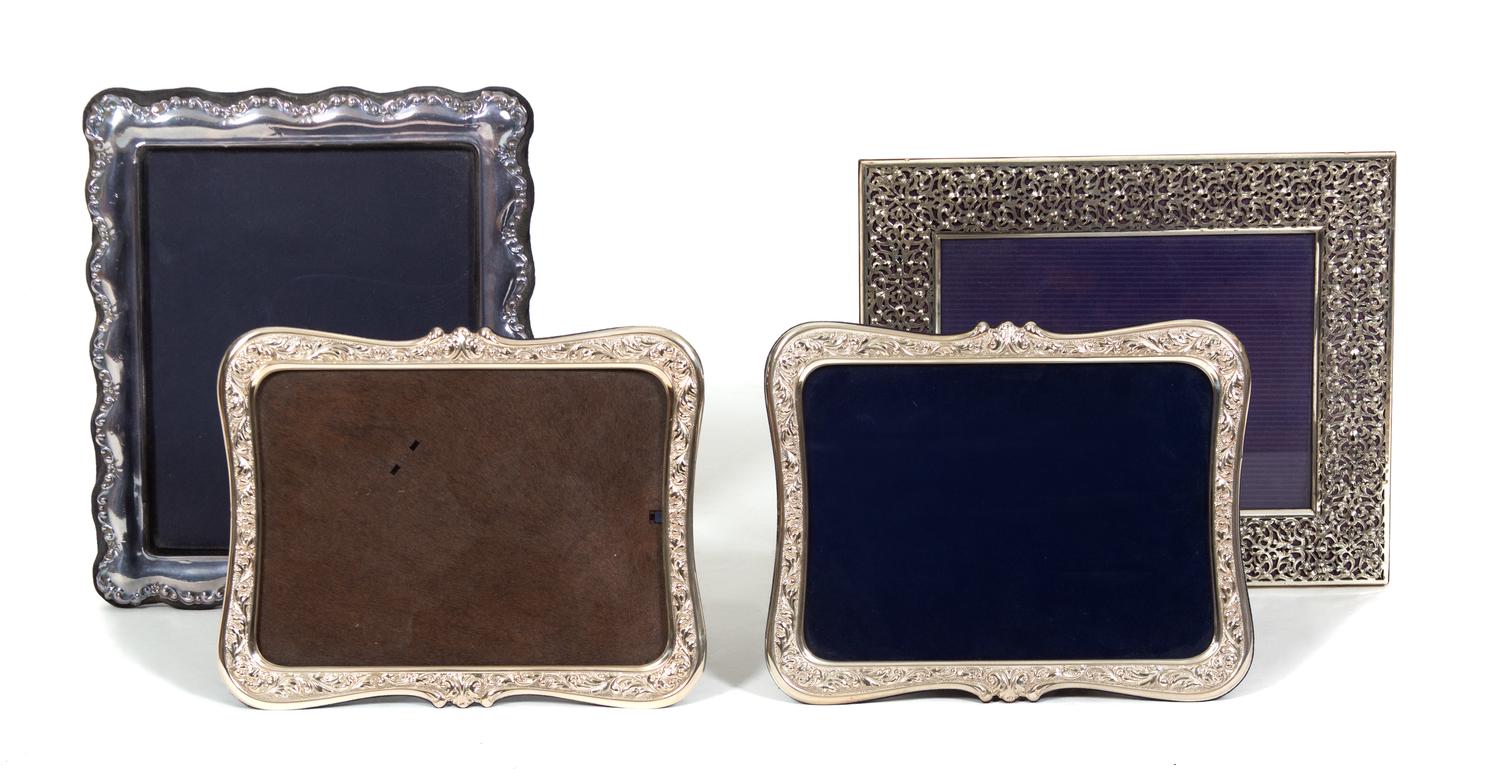 Four Sterling Silver Framed Easel Back Picture Frames Largest, height 13 x width 10 3/4 inches. — 20TH CENTURY