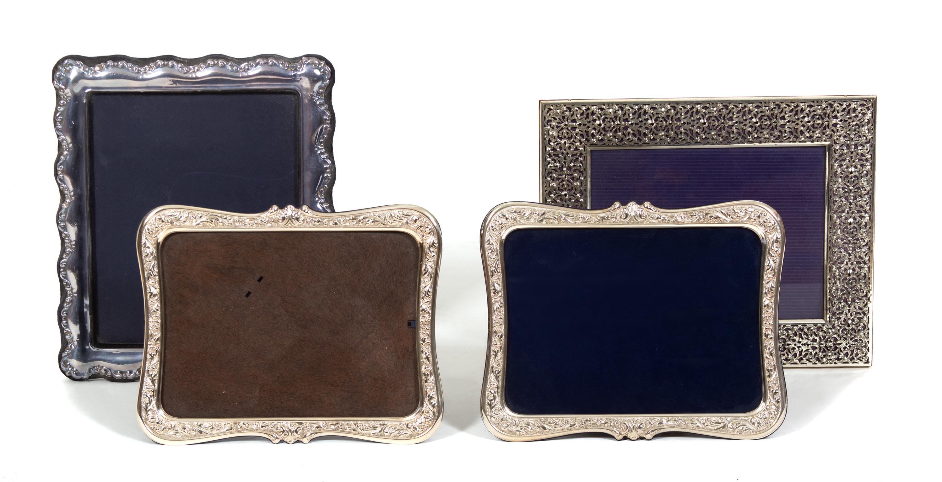 Four Sterling Silver Framed Easel Back Picture Frames Largest, height 13 x width 10 3/4 inches. — 20TH CENTURY