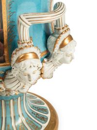 A Pair of Sèvres Style Porcelain Urns