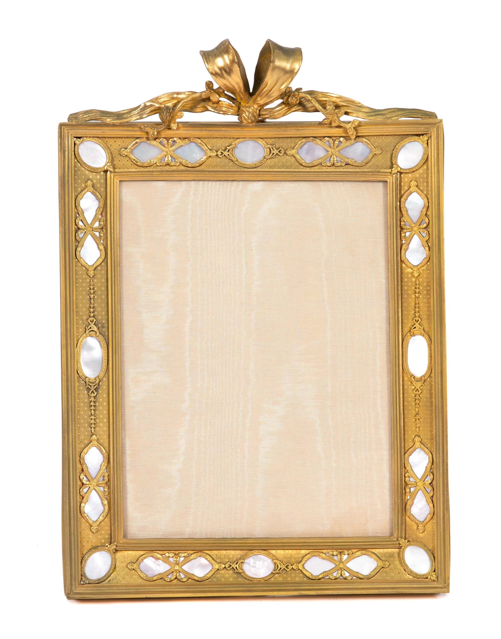 A French Gilt Bronze and Mother-of-Pearl Inset Easel Back Frame Height 14 1/2 x width 10 inches. — 19TH CENTURY