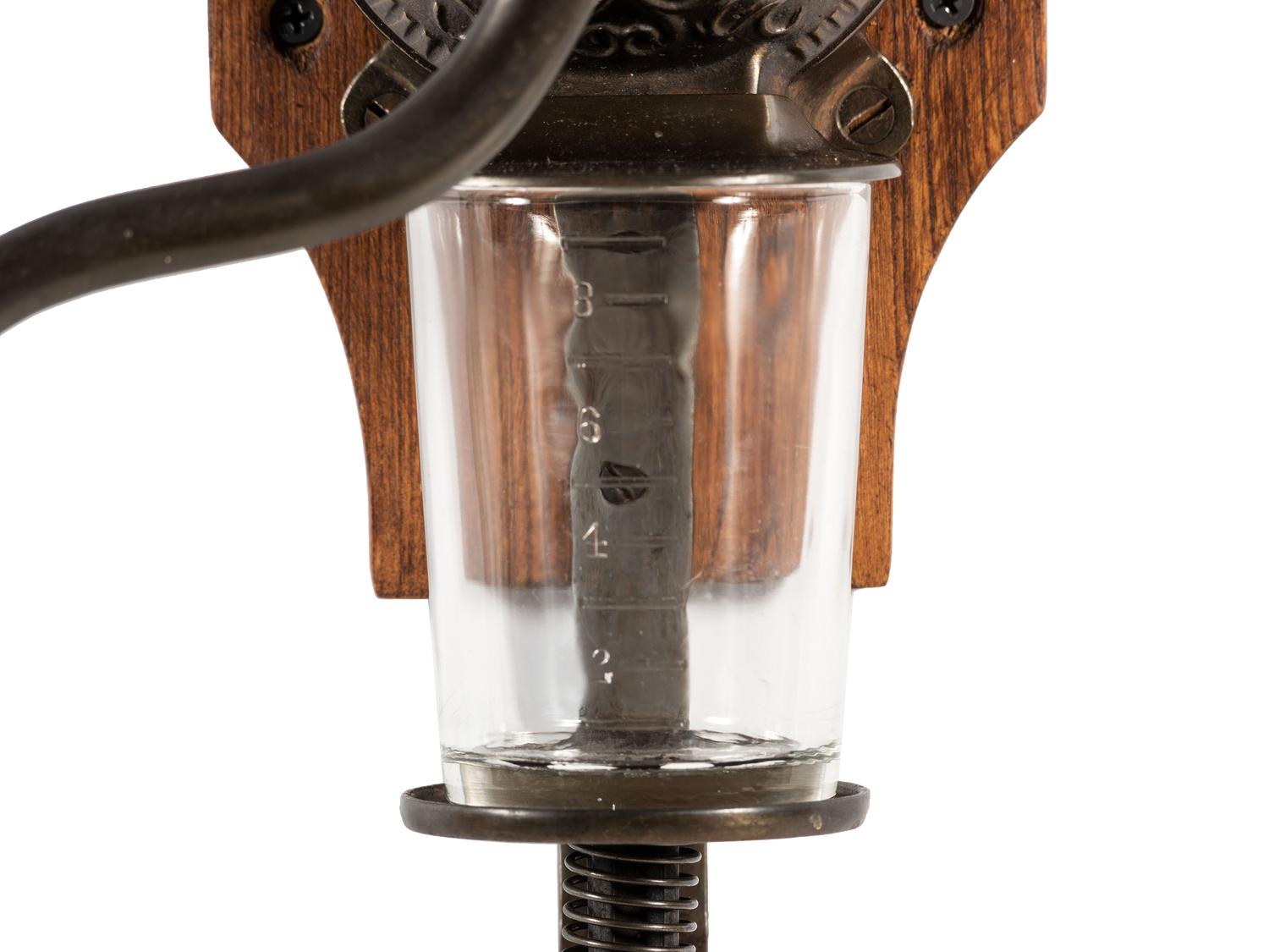 A Bell Cast Iron Wall Mount Coffee Grinder