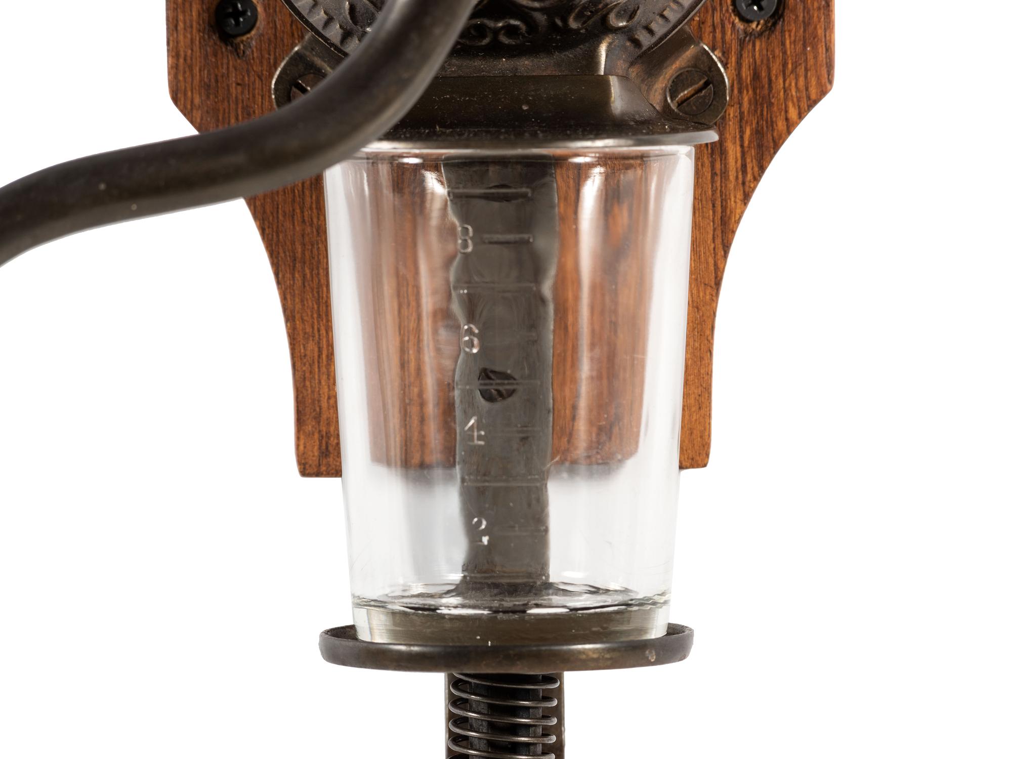 A Bell Cast Iron Wall Mount Coffee Grinder