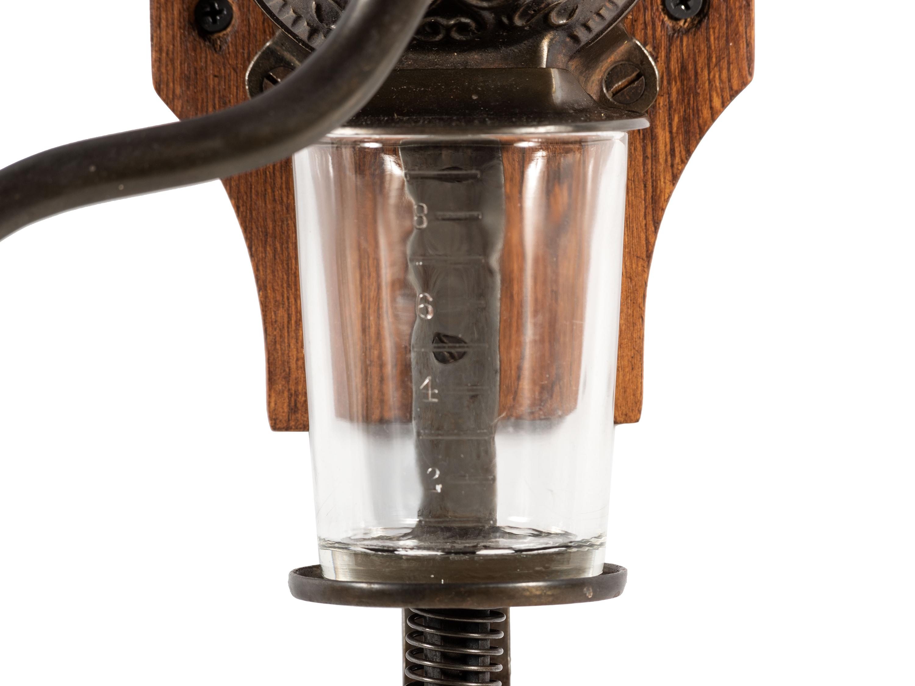 A Bell Cast Iron Wall Mount Coffee Grinder