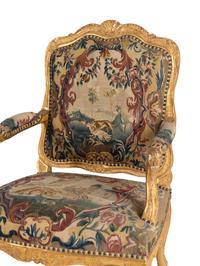 A Pair of Régence Tapestry-Upholstered Giltwood Fauteuils