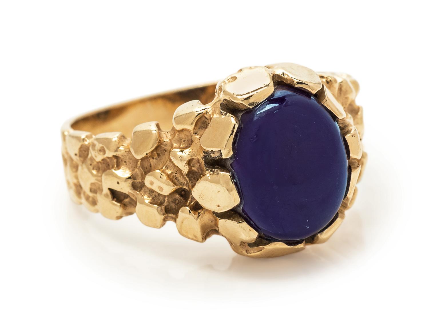 A 14 Karat Yellow Gold and Purple Hardstone Ring,