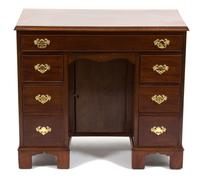 A Chippendale Style Mahogany Kneehole Desk Height 29 1/2 x width 31 1/2 x depth 18 3/4 inches. — FIRST HALF 20TH CENTURY