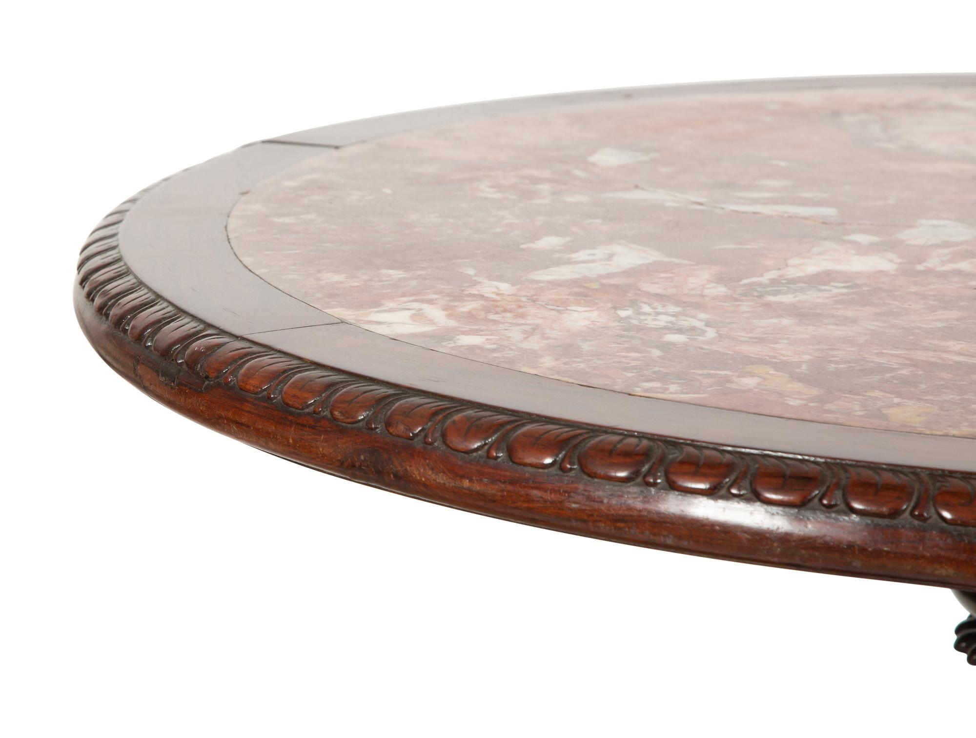 A Mahogany Center Table with Inset Marble Top