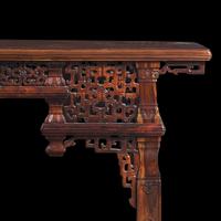A Chinese Carved Huanghuali Side Table, Tiaozhuo, Late 19th to 20th Century 晚清民國 黃花梨透雕夔龍紋條桌