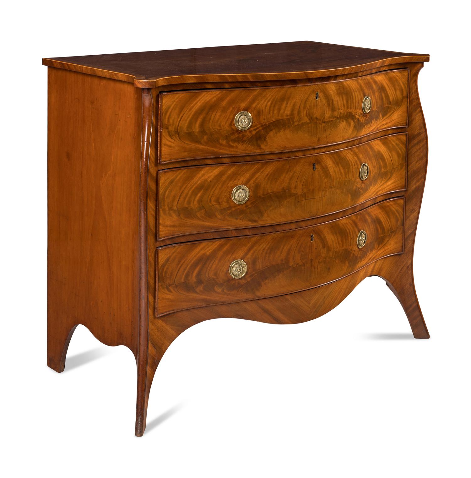A George III Mahogany Serpentine Commode
