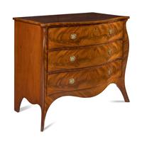 A George III Mahogany Serpentine Commode