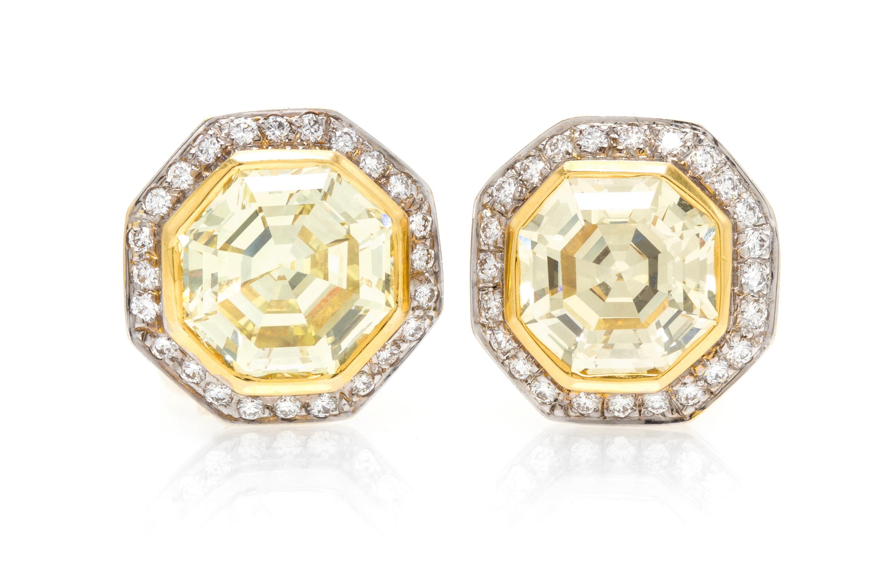 A Pair of 18 Karat Gold, Fancy Color Diamond and Diamond Earclips, 9.20 dwts.