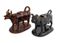 Two Rockingham Glazed Cow-Form Ceramic Creamers — 20TH CENTURY