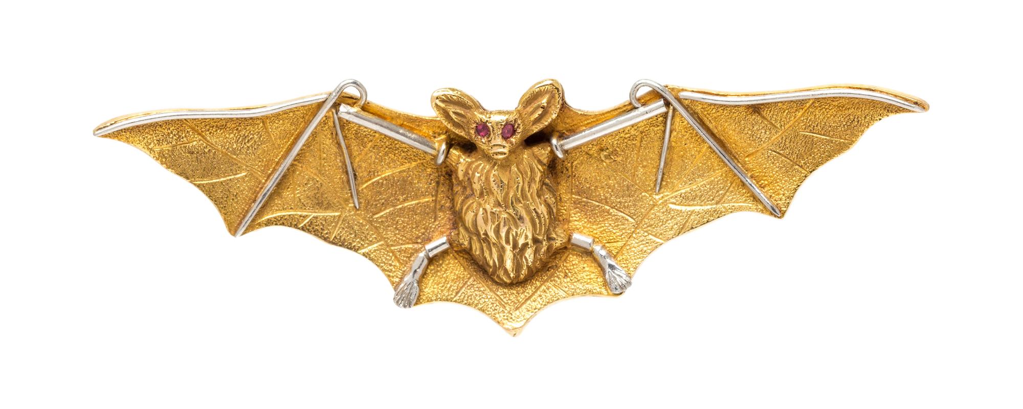 An Art Nouveau Yellow Gold, Platinum and Ruby Bat Brooch, 5.60 dwts.