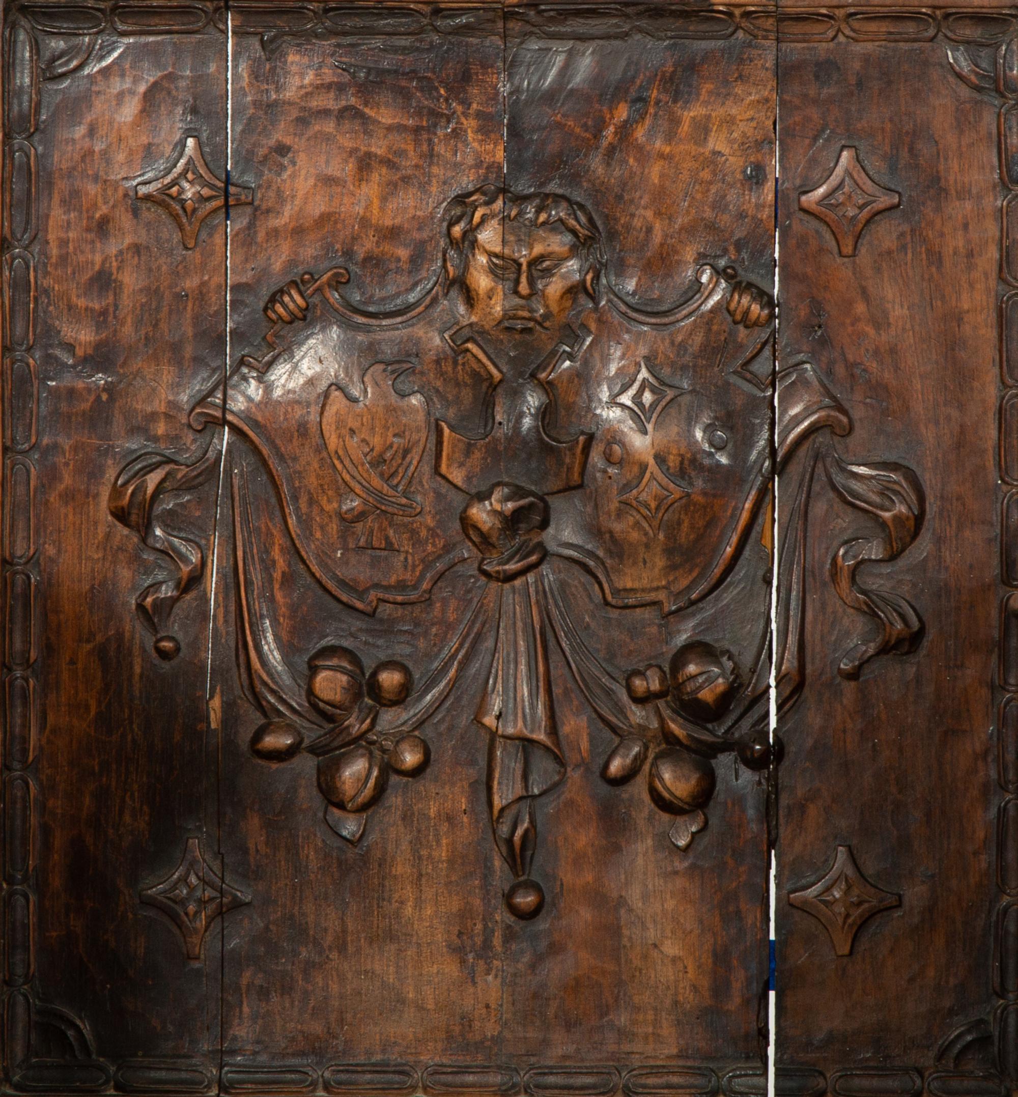 A Near Pair of Late Gothic Walnut and Oak Choir Stalls