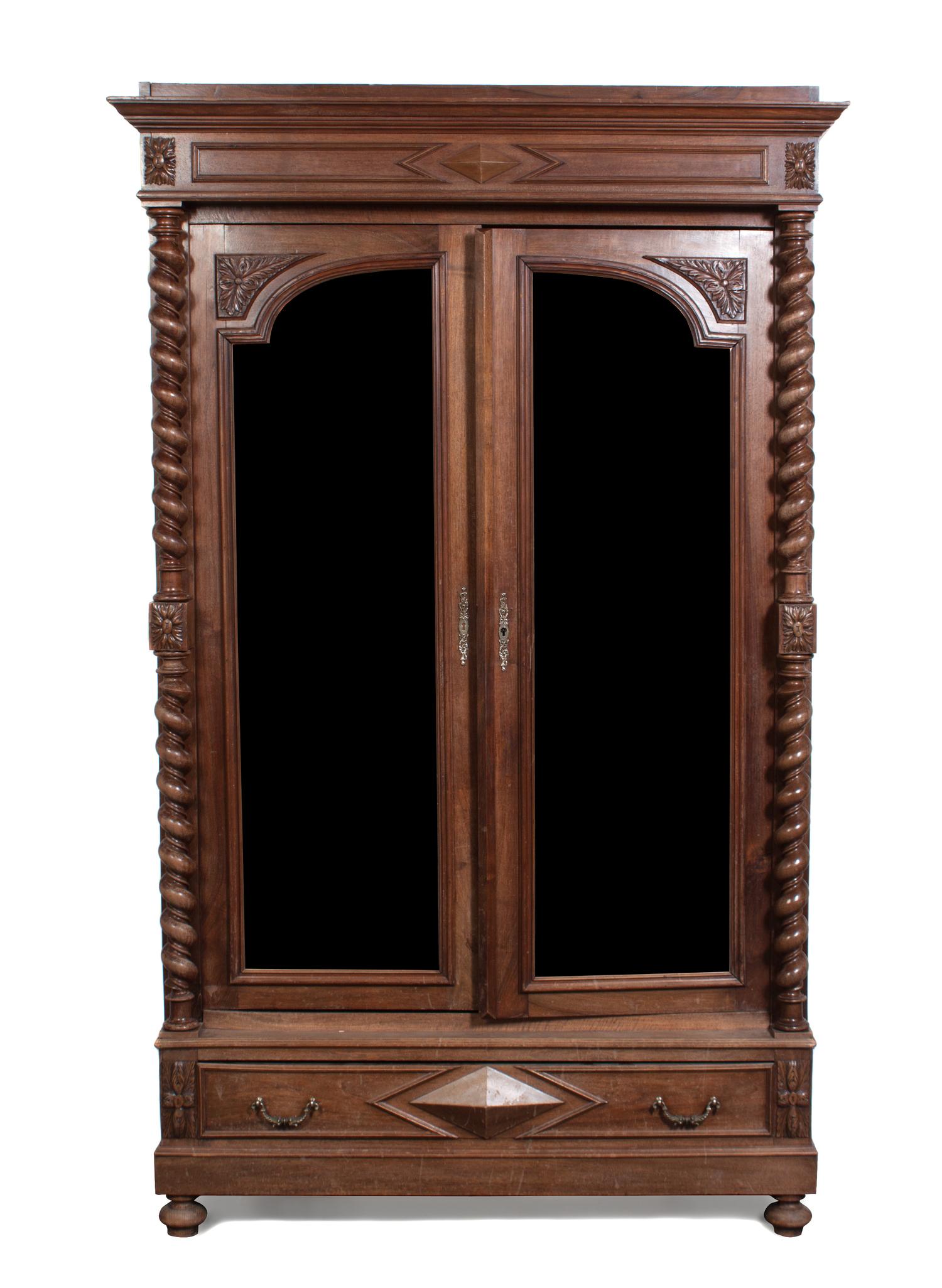 An American Walnut Armoire Height 91 1/2 x width 57 x depth 24 inches.