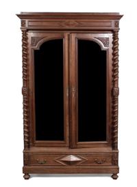 An American Walnut Armoire Height 91 1/2 x width 57 x depth 24 inches.