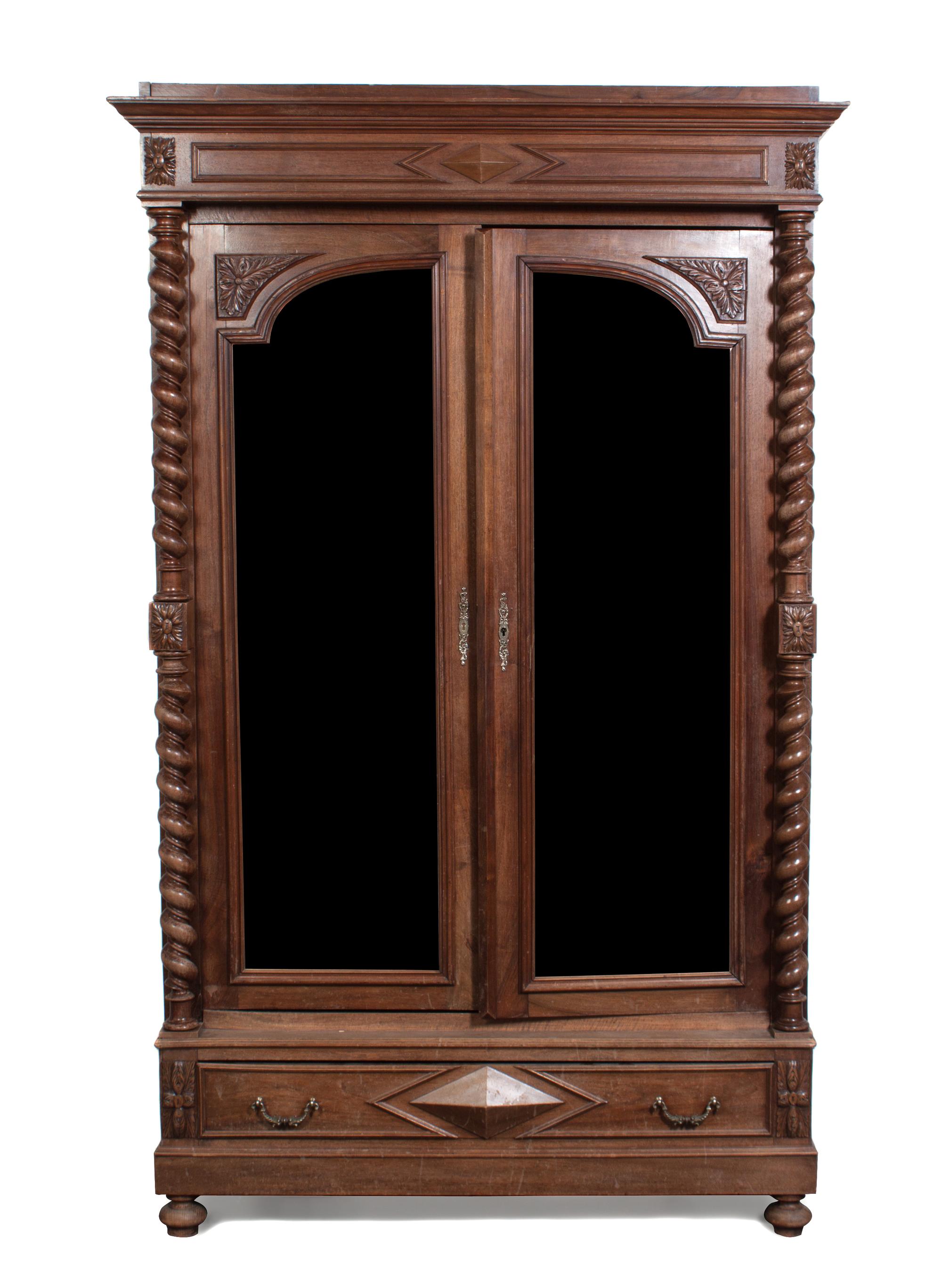 An American Walnut Armoire Height 91 1/2 x width 57 x depth 24 inches.