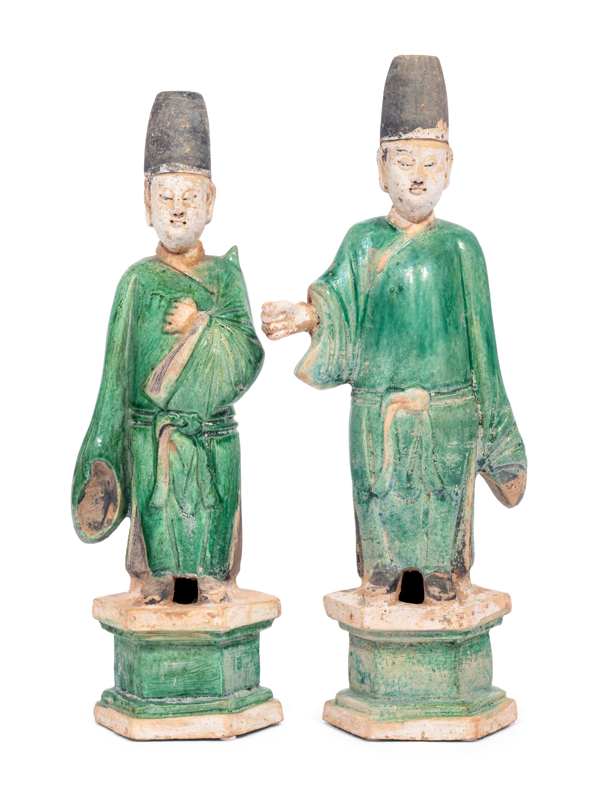 Two Chinese Green Glazed Pottery Figures of Attendants