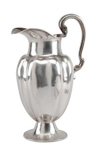 A Mexican Silver Water Pitcher, Conquistador S.A., Mexico City, 20th Century, of lobed baluster form, raised on a trumpet base.