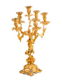 A Louis XV Style Gilt Bronze Clock Garniture
