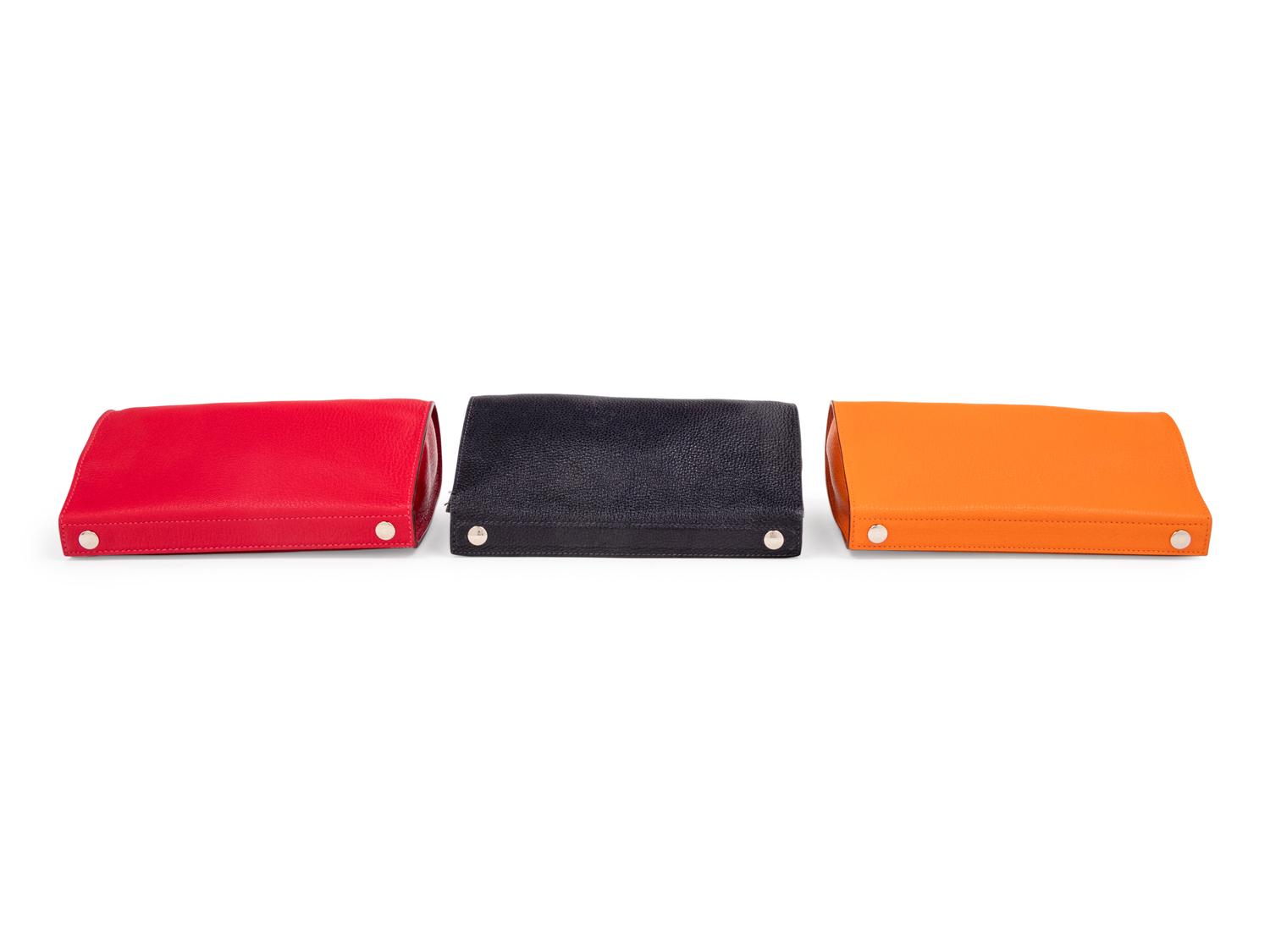 Three Hermès Leather Karo Trousse Cosmetic Bags, 2000-2013