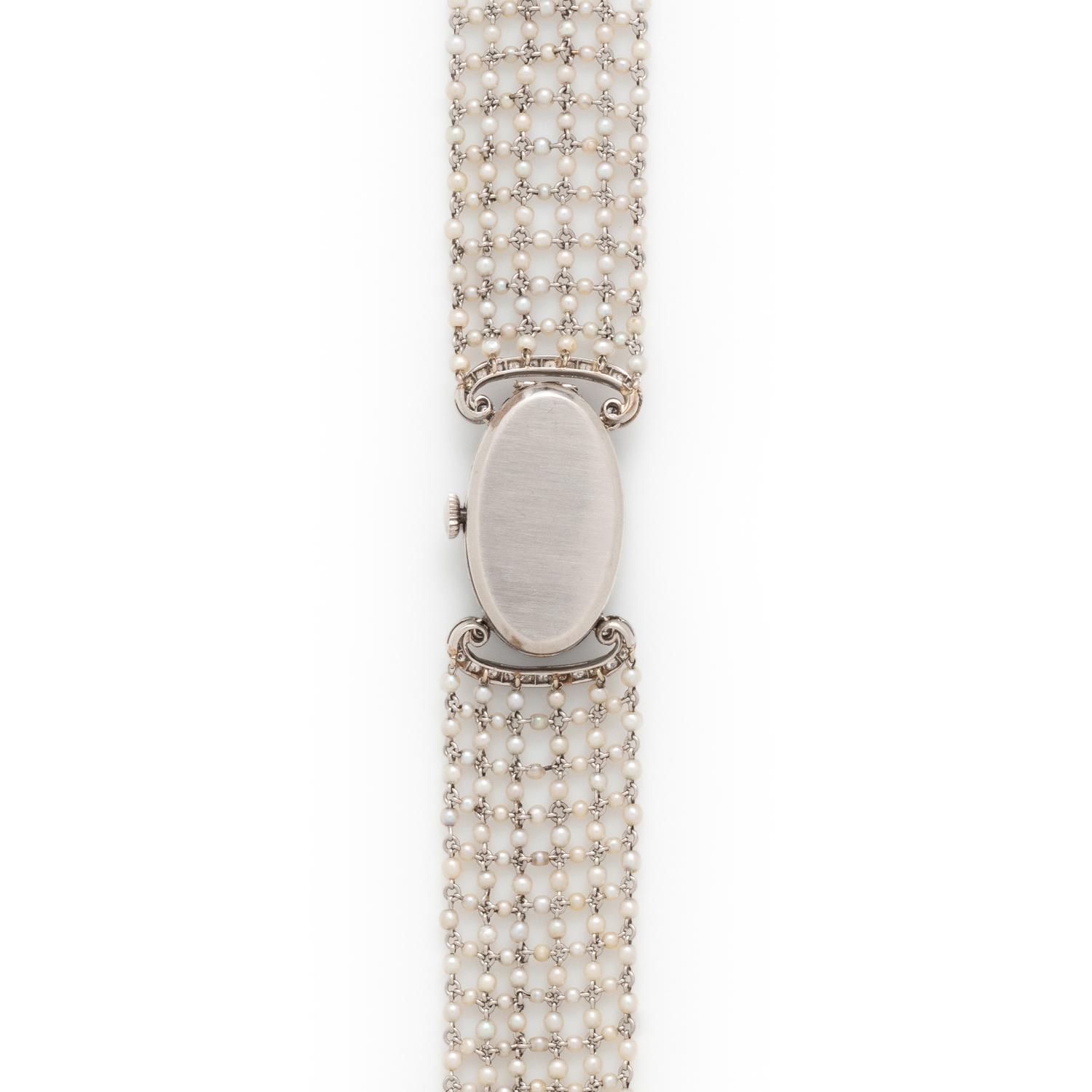 ART DECO, DIAMOND, ONYX AND SEED PEARL WATCH