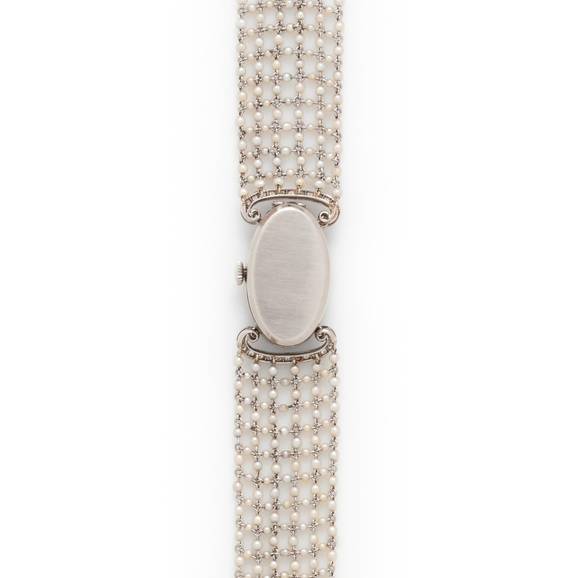 ART DECO, DIAMOND, ONYX AND SEED PEARL WATCH