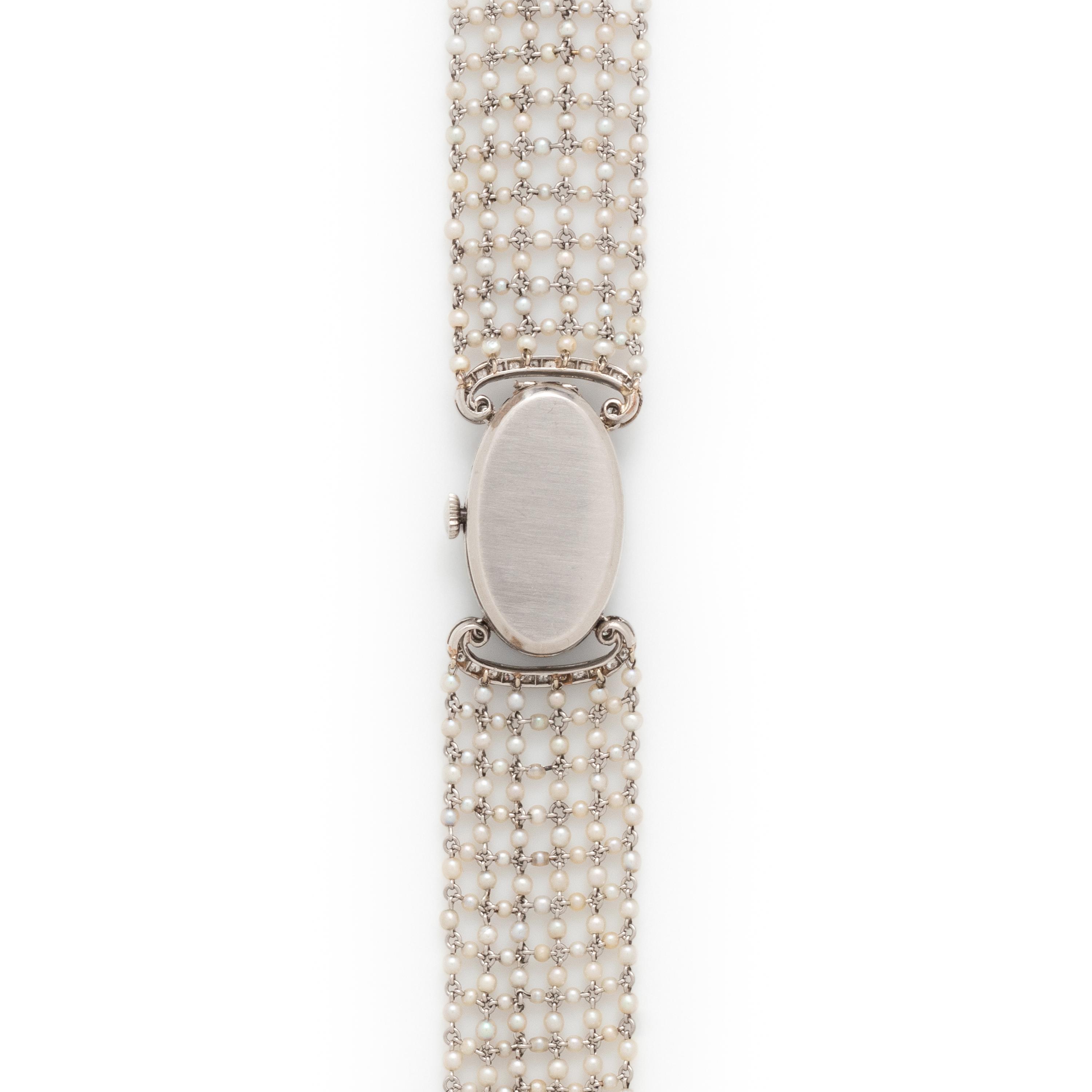 ART DECO, DIAMOND, ONYX AND SEED PEARL WATCH