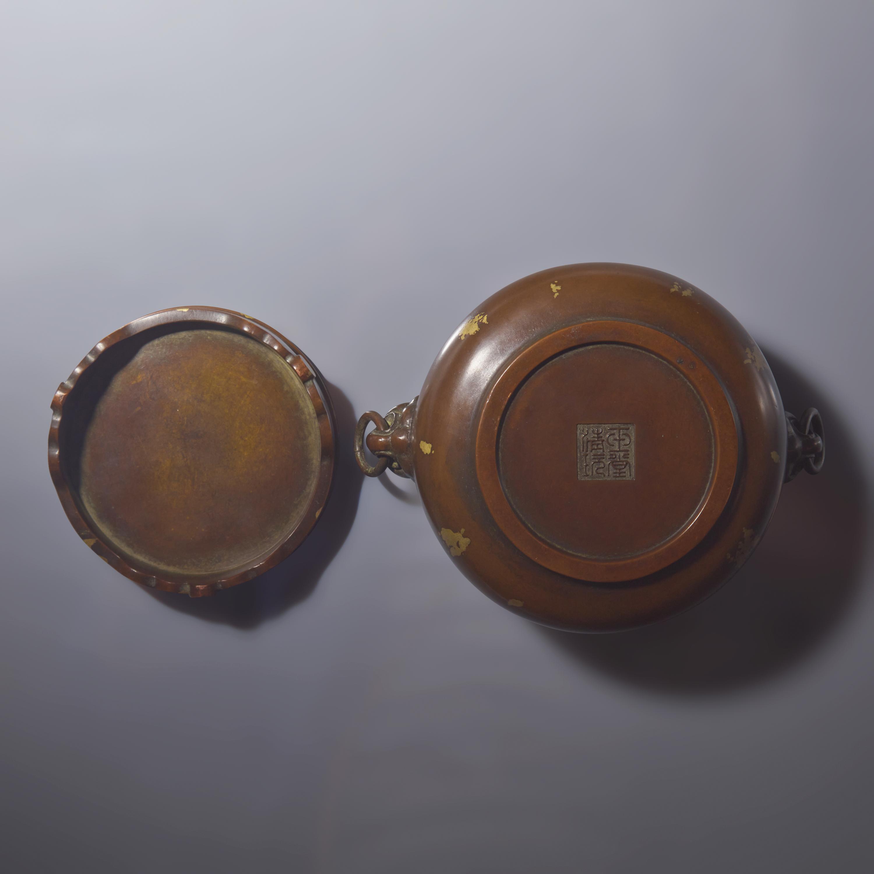 A Chinese Patinated and 'Gold-Splashed' Copper Alloy Censer and Stand — 銅灑金雙耳爐