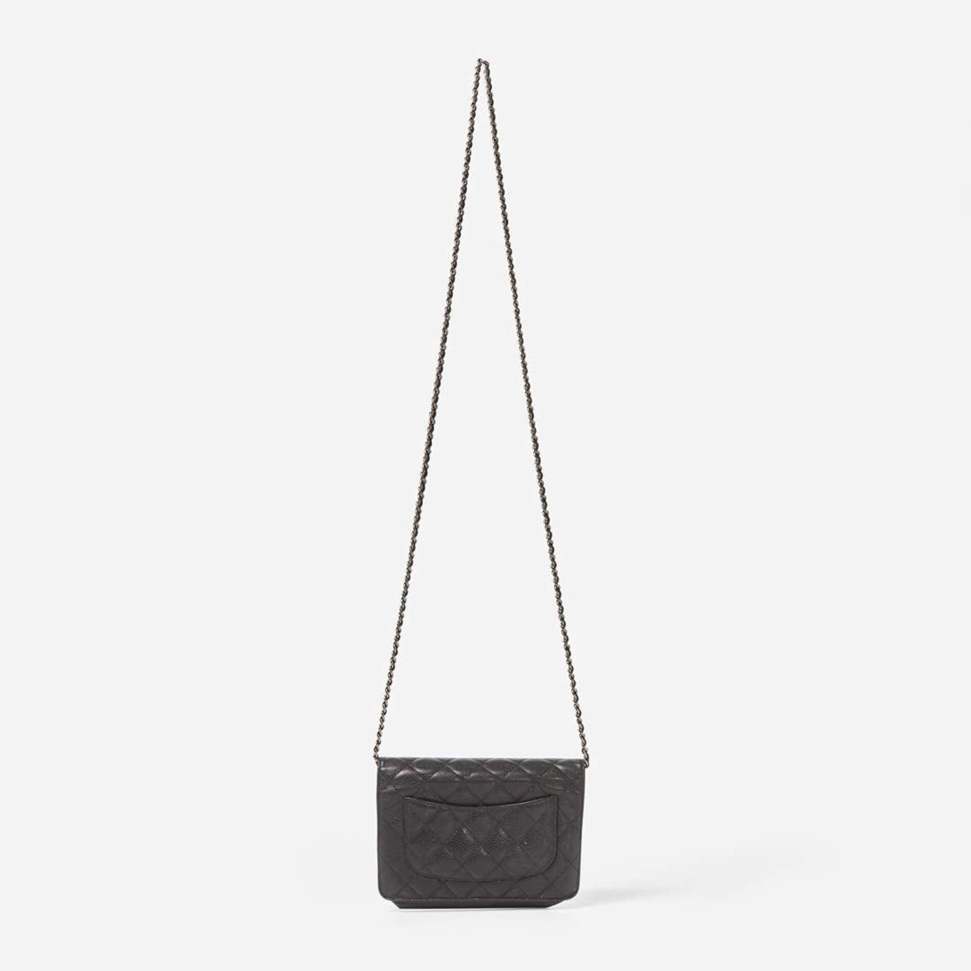 A Chanel Black Quilted Crossbody Purse Chanel