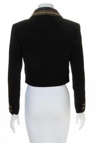 A Gianni Versace Black Cropped Jacket with Grommet Detail, Size 38.