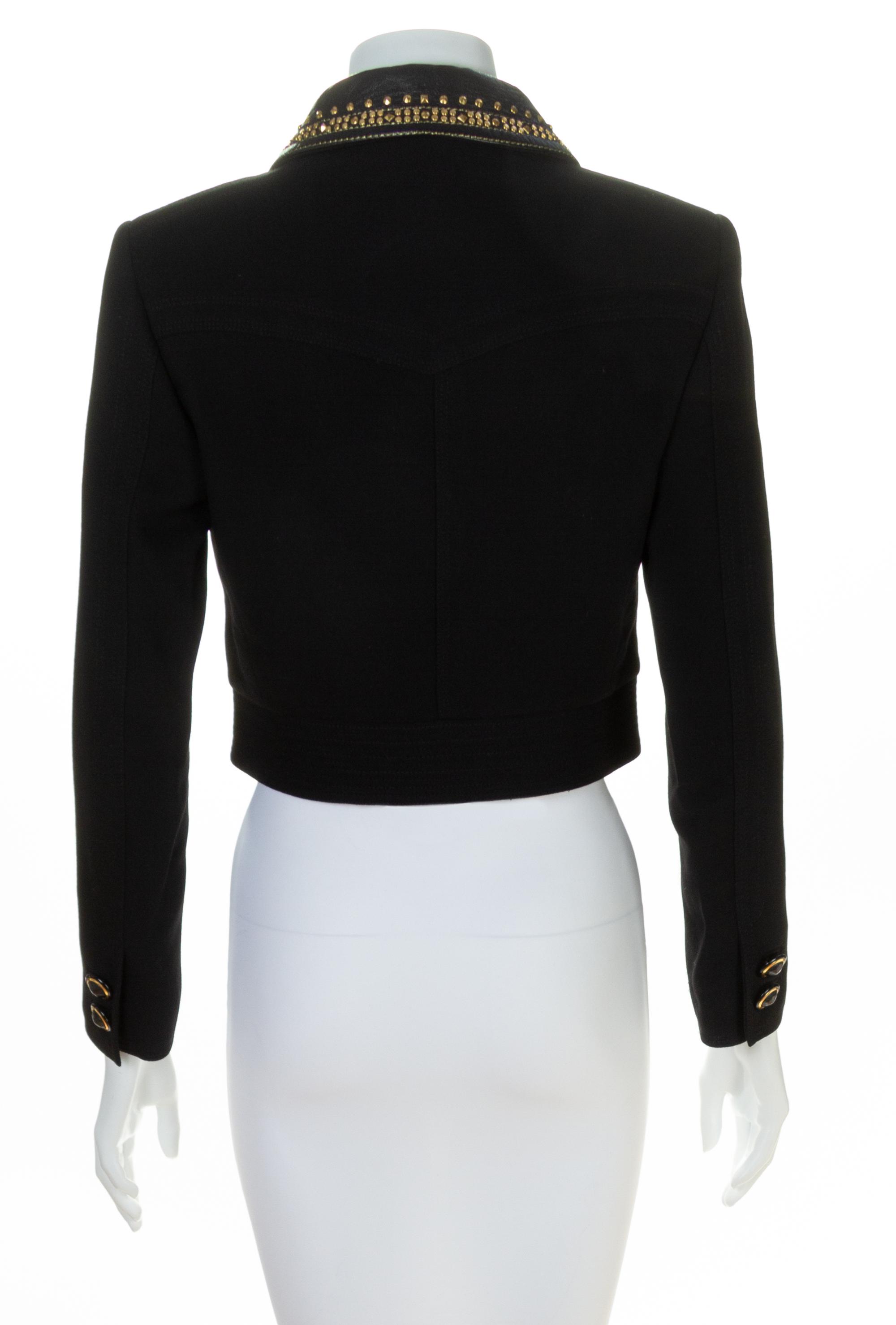 A Gianni Versace Black Cropped Jacket with Grommet Detail, Size 38.