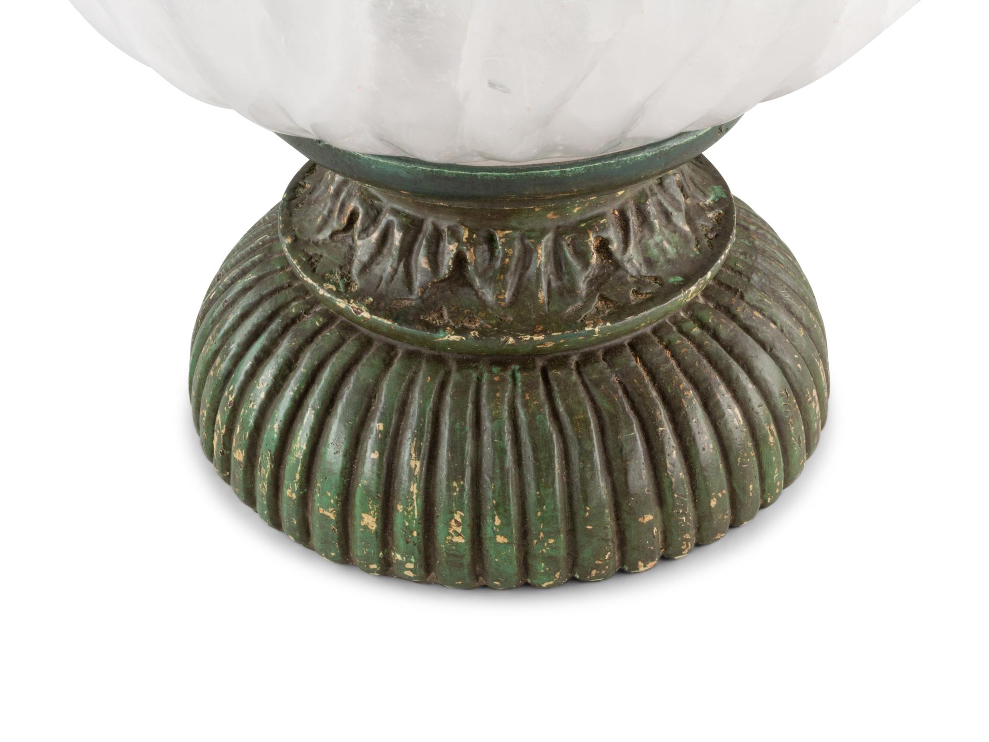 A Large Fluted Rock Crystal Bowl on a Painted Wood Stand