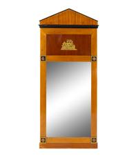 A Biedermeier Style Gilt Metal Mounted and Parcel Ebonized Mirror