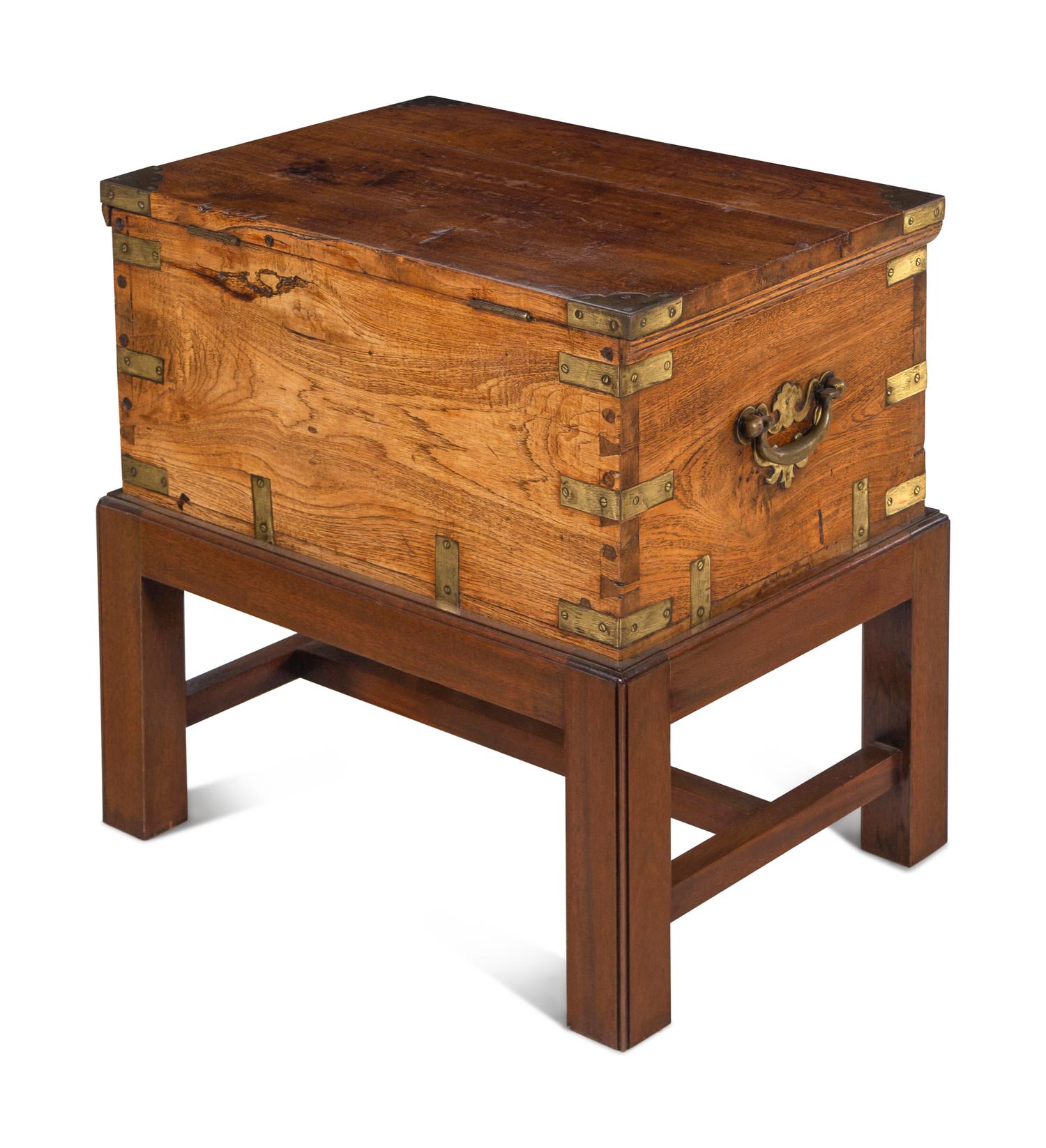 An Anglo-Colonial Brass Mounted Hardwood Campaign Trunk on a Later Stand