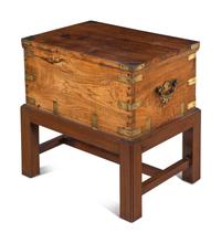 An Anglo-Colonial Brass Mounted Hardwood Campaign Trunk on a Later Stand