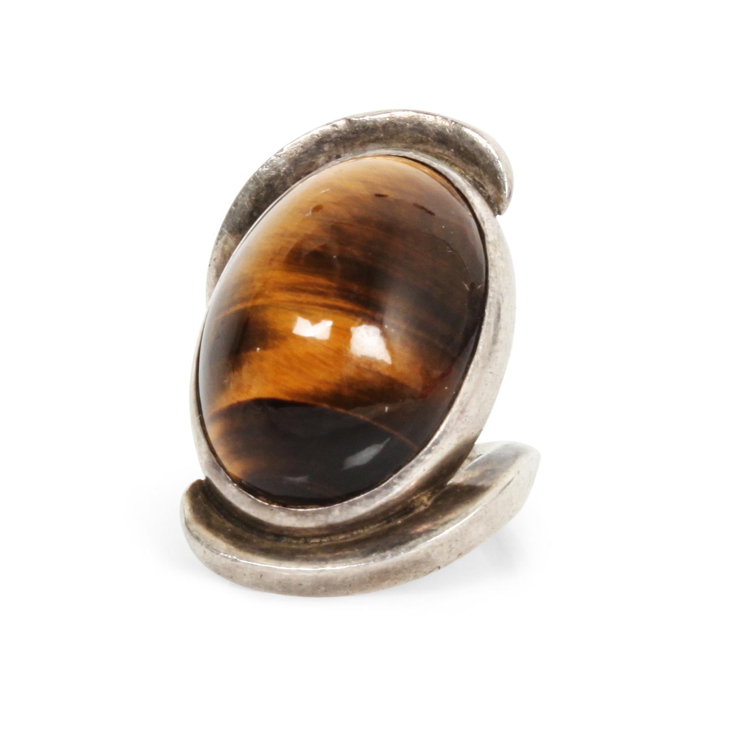 A Mexican Silver and Tiger's Eye Ring, Antonio Pineda (1919-2009) Length 1 3/8 inches.