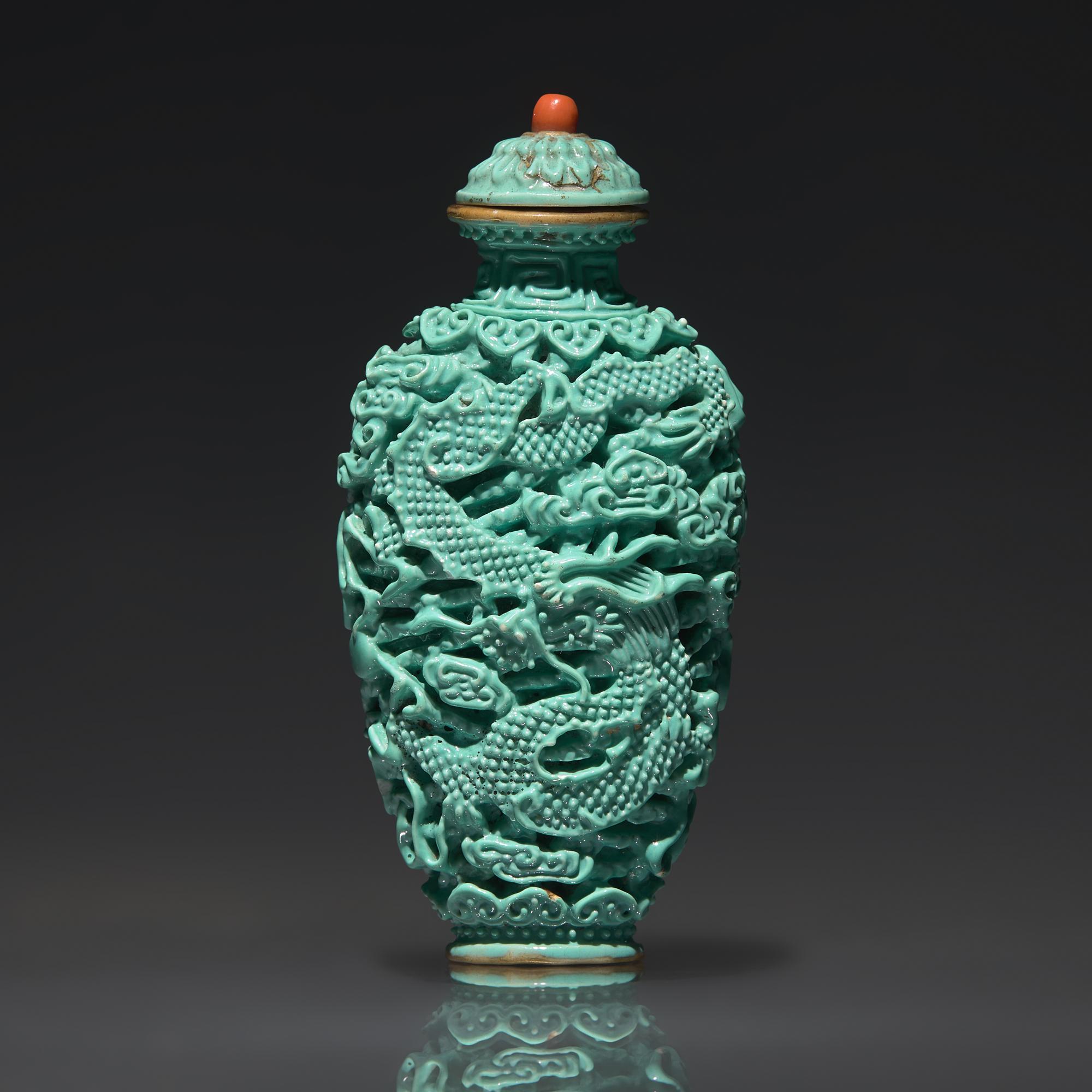 A Chinese Turquoise-Glazed Molded "Dragon and Phoenix" Snuff Bottle, Qing Dynasty, Jiaqing Period — 清嘉慶 松石釉模印龍鳳紋鼻煙壺