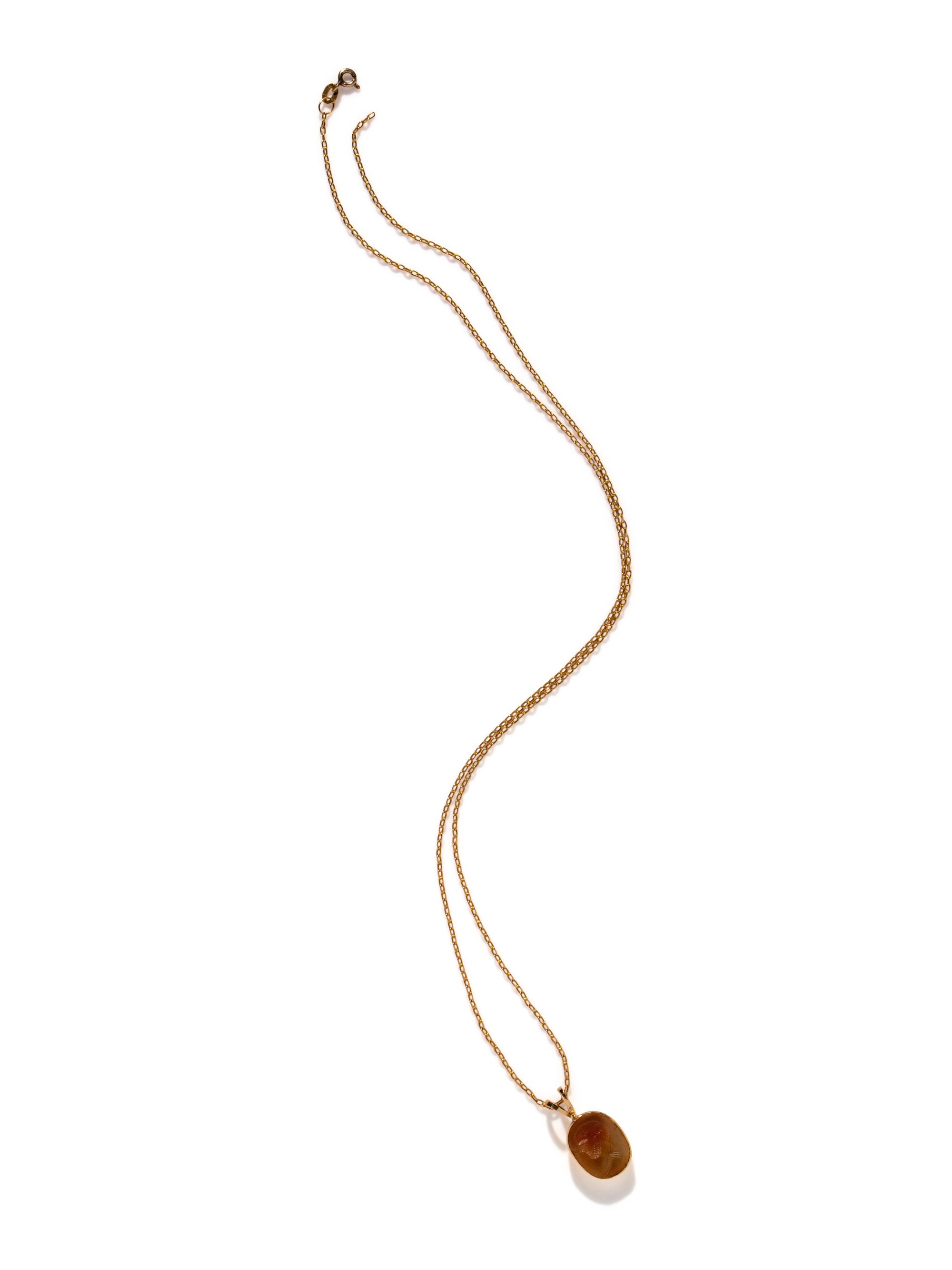 A Neoclassical Gold and Carnelian Pendant with a Male Portrait Head — with a modern gold chain