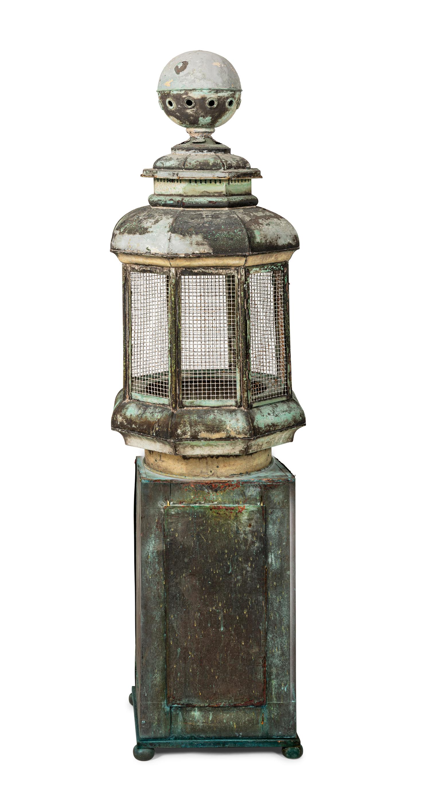 A Pair of Weathered Painted Sheet Metal Lanterns Converted to Bird Cages