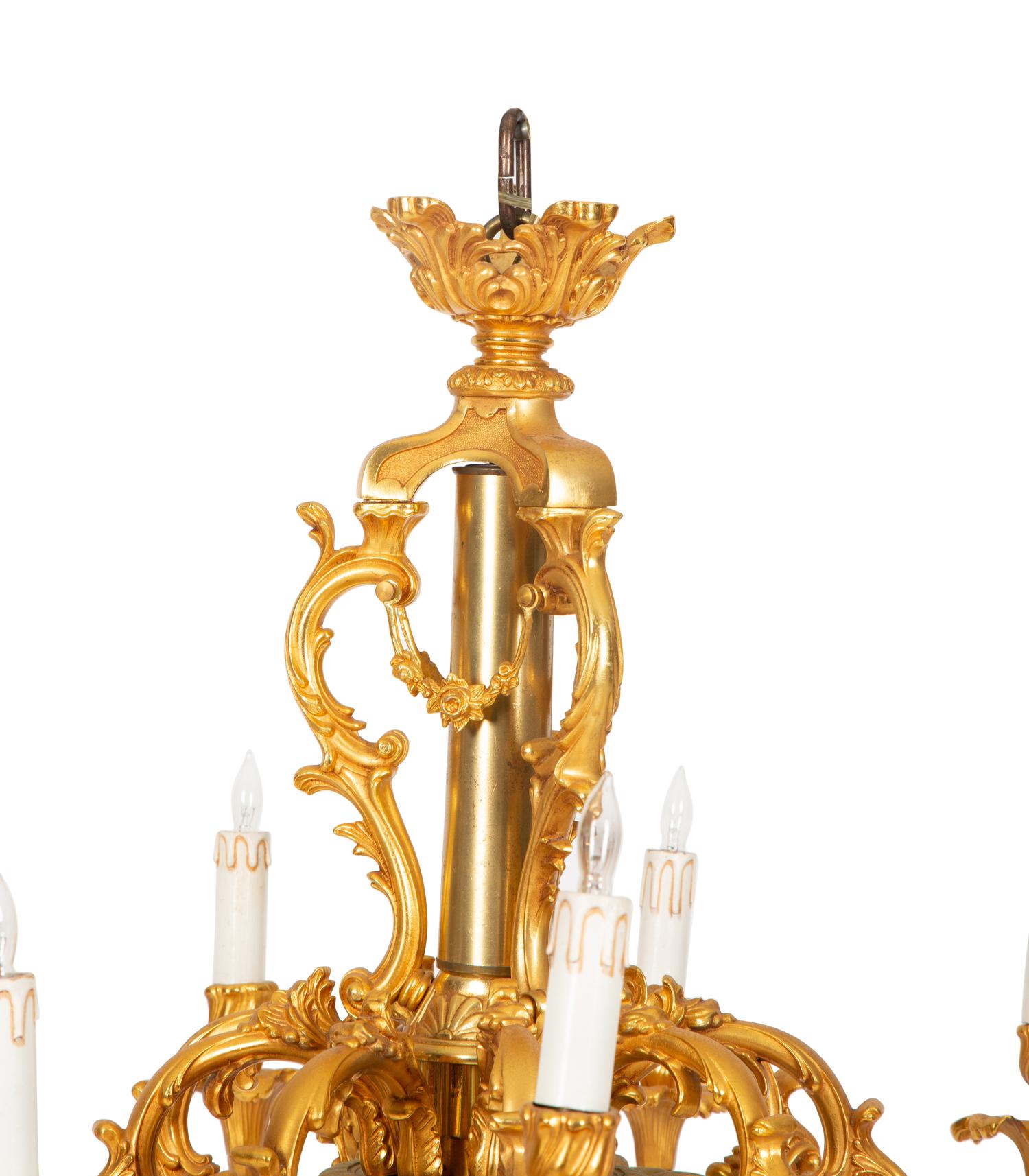 A Pair of Sèvres Style Porcelain and Gilt Bronze Nine-Light Chandeliers
