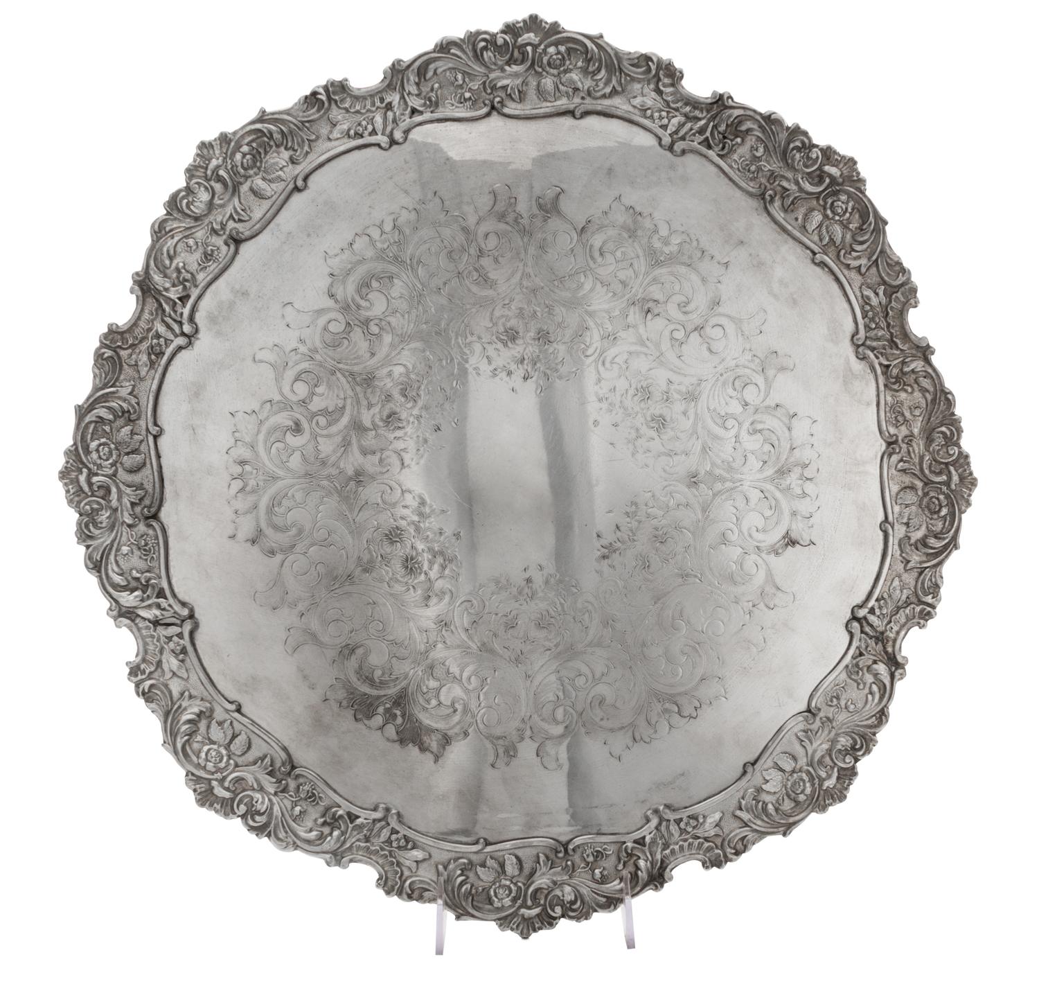 Two English Silver-Plate Trays, 20th Century, comprising an oval handled tray and a circular tray, each after the 18th century original