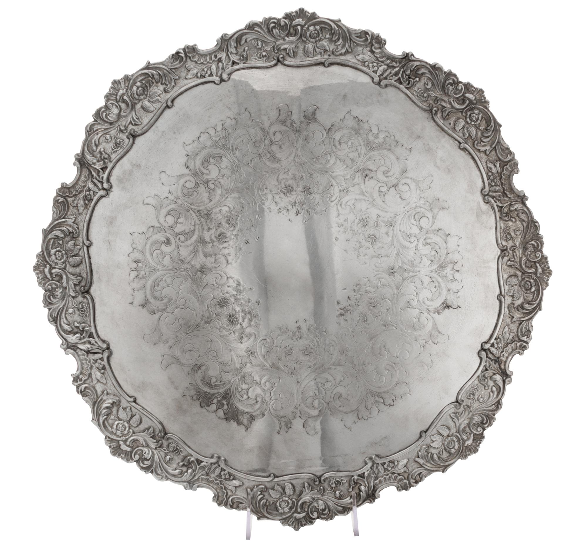 Two English Silver-Plate Trays, 20th Century, comprising an oval handled tray and a circular tray, each after the 18th century original